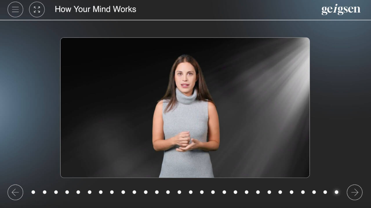 Screenshot from Geigsen showing “How Your Mind Works” video with a woman speaking on a dark background.